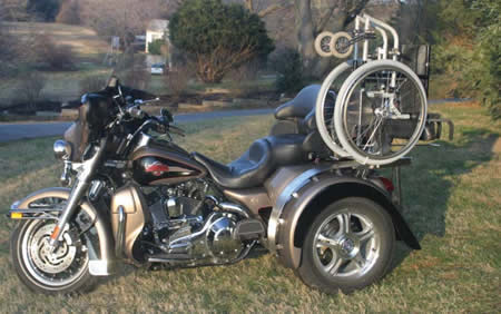 A photo of a wheelchair lift on a custom trike.