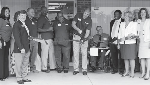 Photo of the ribbon-cutting at DME store, August 3, 2011
